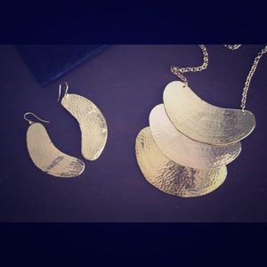 Gold necklace and earring set.